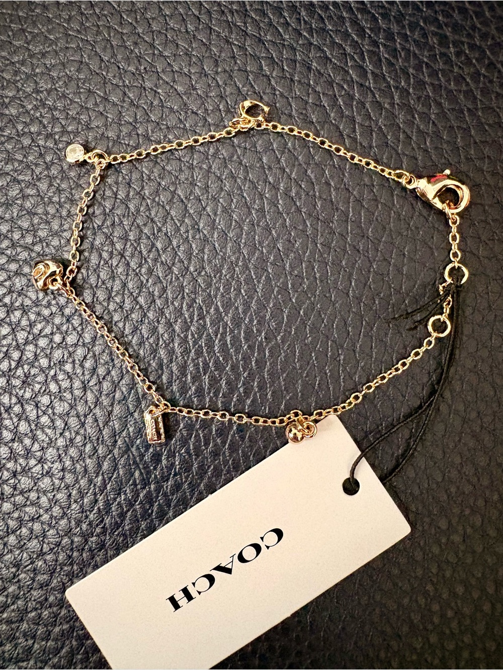 Coach Gold Charm Chain Bracelet